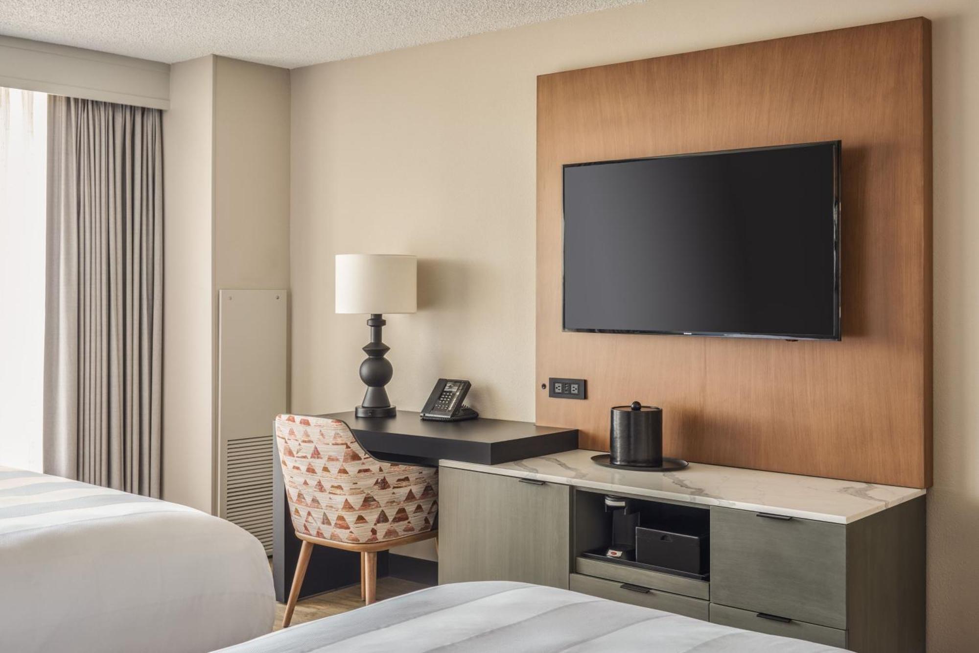 Queen Room with Two Queen Beds, Balcony and City View