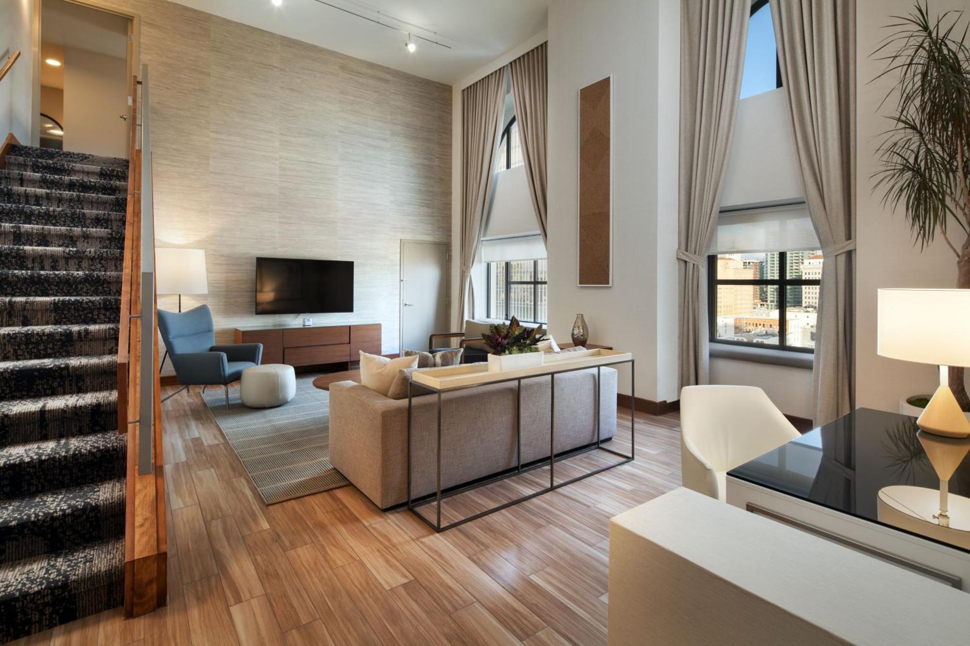 Renewal Suite 1 Bedroom Bi-level Suite 1 King Sofa bed